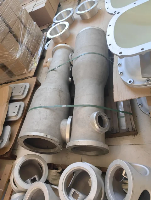 Aluminum casting components with cylindrical sections and flanged connections
